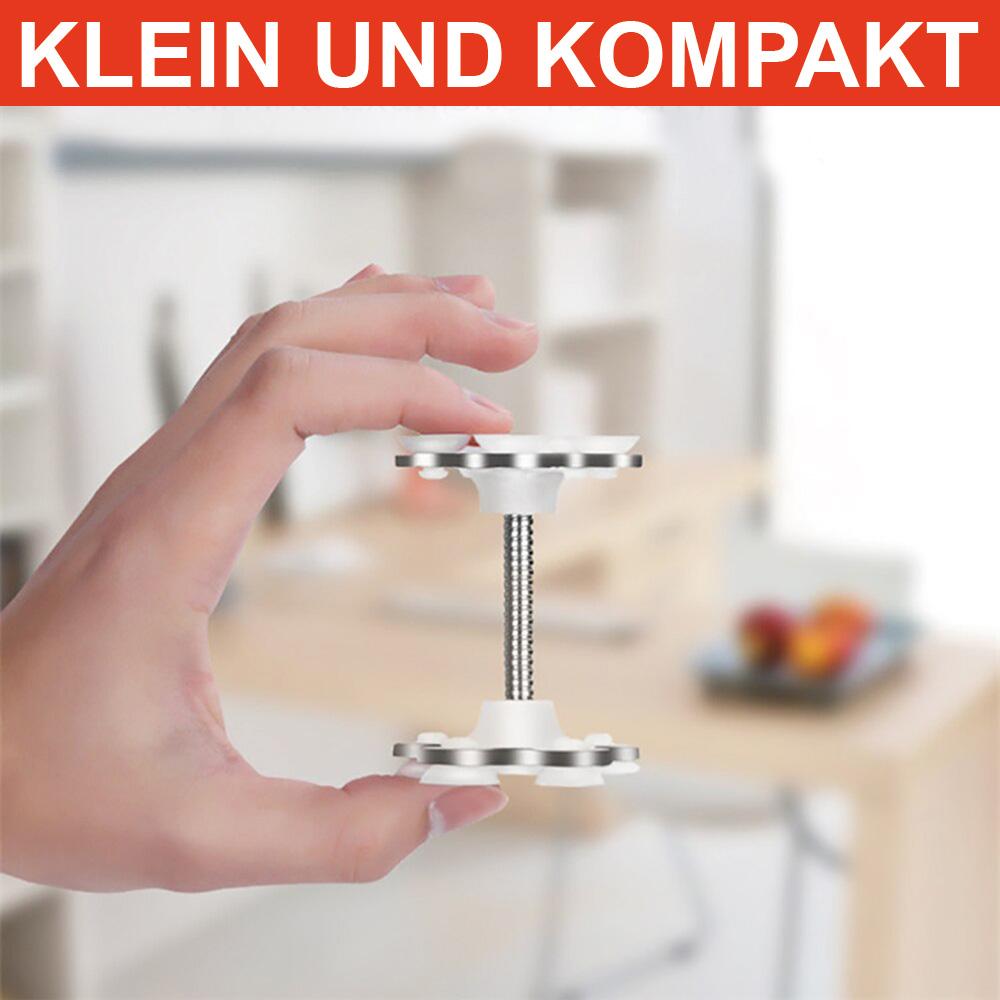 Weiß-silberner Handyhalter mit Saugnäpfen wird von Hand vor unscharfem Hintergrund präsentiert
