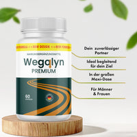 Thumbnail for Dose Wegolyn Premium auf Holzpodest mit vier sichtbaren Produktmerkmalen und dekorativen Blättern